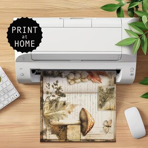May include: A vintage-style printable design featuring a mushroom, leaves, and a book with handwritten text. The design is printed on a white background with brown and green accents.