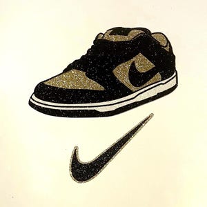 nike trainers gold tick