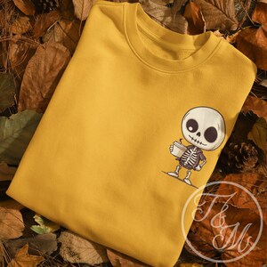 Halloween Cute Cartoon Skeleton with Coffee Graphic Design on Heavy Blend Crewneck Sweatshirt, Spooky Season Design, Halloween Sweater