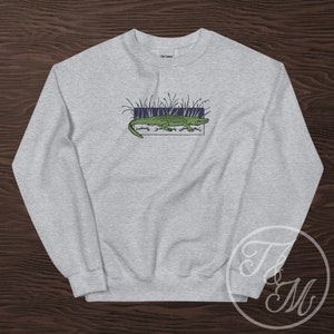 Embroidered Alligator Design on Unisex Heavy Blend Sweatshirt