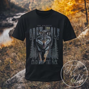 Majestic Grey Wolf T-shirt - Leader of the Pack, Wildlife Tee, Graphic Shirt for Nature Lovers, Unisex Apparel, Gift for Adventurers