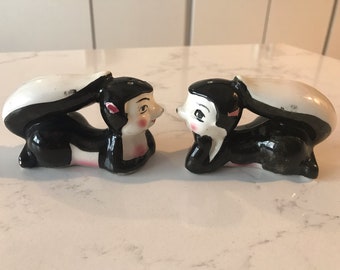 Vintage Ceramic Adorable and Cute Skunks Laying Down Salt & Pepper Shakers, Antique, Made in Japan