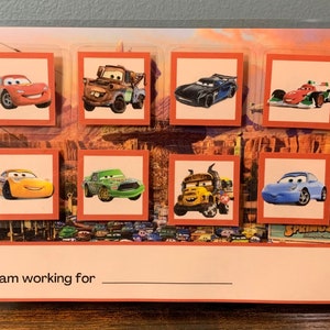 May include: A colourful board game featuring eight different Cars characters, including Lightning McQueen, Mater, and Francesco Bernoulli. The board has a red border and the text "I am working for ______" at the bottom.