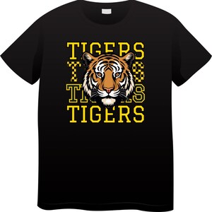May include: Black t-shirt with a yellow graphic of a tiger's face and the text "TIGERS TIGERS TIGERS"