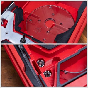 May include: A red plastic storage case featuring molded compartments containing a clear circular router base plate, a metal guide fence, and two silver metal collets. The interior is lined with black foam inserts to secure the tools in place.