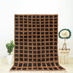 A Black boho Moroccan Beni Ourain checkered rug