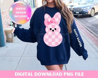 May include: A navy blue sweatshirt with a pink checkered bunny with a pink bow on its head. The bunny is centered on the front of the sweatshirt. The text "HAPPY EASTER" is printed on the right sleeve of the sweatshirt.
