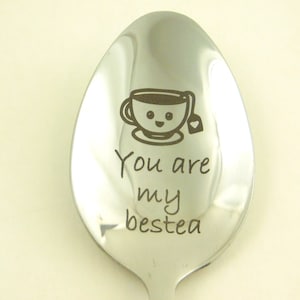 May include: A silver spoon with a cute cartoon teacup and the text "You are my bestea" engraved on it.