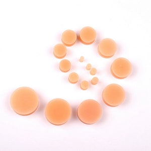 11+ Flesh Color Plugs