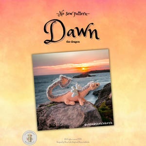 May include: A crochet pattern for a pink and white dragon named Dawn. The pattern is a no-sew pattern and is designed by Mona Sheklekrok. The image shows the finished dragon sitting on a rock with a sunset in the background.