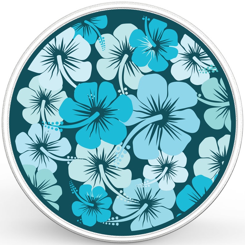 May include: A round coin with a silver rim and a teal blue background. The coin is decorated with a pattern of blue and light blue hibiscus flowers.