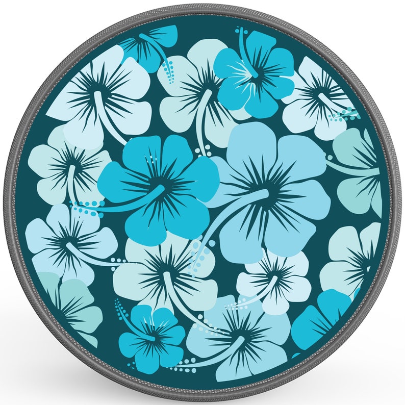 May include: A round, teal blue fabric coaster with a repeating pattern of light blue and turquoise hibiscus flowers.