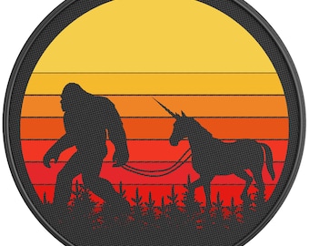 May include: A black and white silhouette of Bigfoot walking with a unicorn in front of a retro sunset with orange, red and yellow stripes.