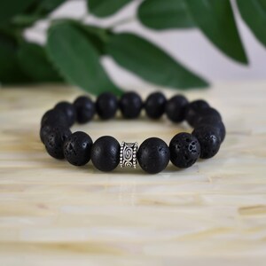 Lava Stone Bracelet: Sterling Silver Accent, Root Chakra