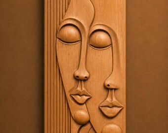 May include: A rectangular light brown wooden wall panel featuring a carved relief of two abstract faces with closed eyes and lips. The left side has vertical grooves. Text at the top reads 60 cm and 3DM • FBX • STL, with Instant Download at the bottom.