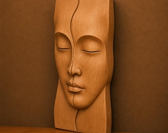 May include: A light brown wooden wall sculpture featuring a stylized human face with closed eyes and a vertical line dividing the features. The text 60 cm, 3DM, FBX, STL, and Instant Download are visible on the image. The sculpture has a smooth finish.