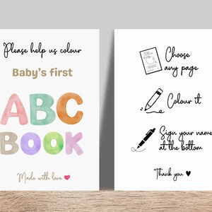 Puede incluir: Dos tarjetas blancas con texto. Una dice "Please help us colour Baby's first ABC BOOK Made with love." La otra dice "Choose any page, Colour it, Sign your name at the bottom, Thank you."