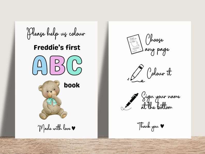 May include: A children's ABC book with a teddy bear illustration. The cover reads "Freddie's first ABC book" in colorful letters. Instructions on the right side say "Choose any page, Colour it, Sign your name at the bottom."
