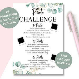 May include: A white A5 card printed with a "Photo Challenge" game, featuring selfie prompts and eucalyptus decorations. A pink pen is positioned on the right. The card is designed for a hen party.