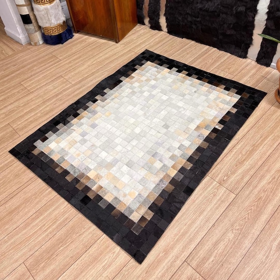 天然牛革ラグ 茶色と白の模様 牛革ラグ 茶色と白のパターン