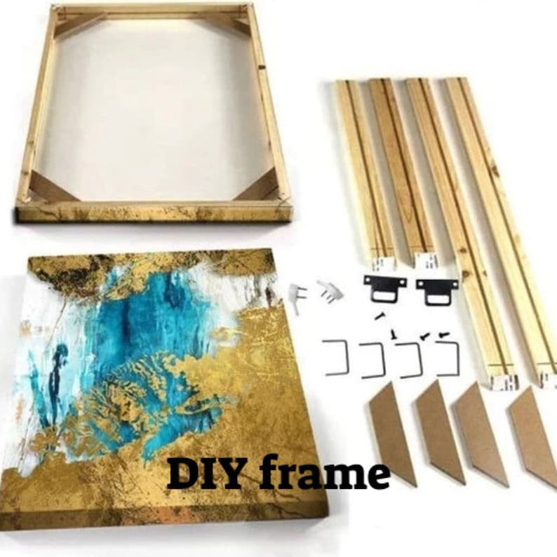 May include: A DIY frame kit for a canvas painting. The kit includes four wooden frame pieces, four corner connectors, four metal hanging brackets, and four cardboard corner pieces. The canvas painting is a gold and blue abstract design.