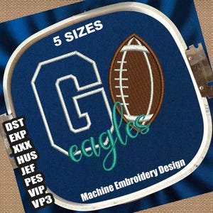 May include: Embroidered design of a white "G" with a teal "Eagles" script and a brown football. The design is on a blue background with the text "5 SIZES" and "Machine Embroidery Design".