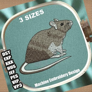 May include: Machine embroidery design of a brown and grey rat with a white tail, sitting on a blue background. The design is available in three sizes. The text "3 SIZES" is written in white on a blue background.