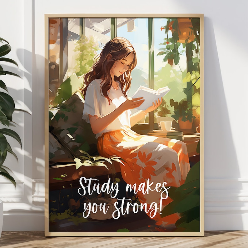 May include: A framed art print depicts a woman reading a book in a sunlit garden setting. She wears a white top and an orange floral skirt. The text "Study makes you strong!" is displayed in white script at the bottom.
