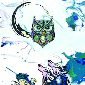 May include: Tarot card depicting the Moon card, XVIII, with a crescent moon, an owl, and two wolves howling at the moon. The card is on a white background with blue and green marbling. The card also includes the astrological symbol for Pisces, a black dot, a rabbit, a mandala, a triangle, the symbol for Venus, and a rune.