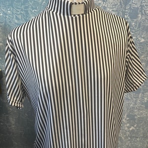 black and white pinstripes stretch vicar ,clergy,dickie vestment top .made to order in soft black and white spandex .many sizes available