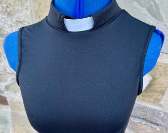 Black stretch vicar ,clergy,dickie vestment top .made to order in soft black spandex .many sizes available