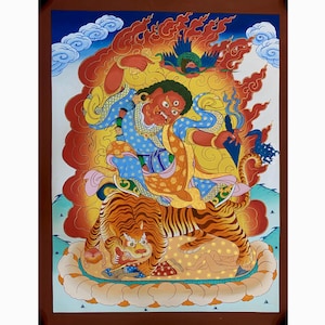 fine quality colorful Guru dorje drollo on tiger. Crazy wisdom Guru on pregnant tigress. Dorje drolo thangka painting. hand painted.