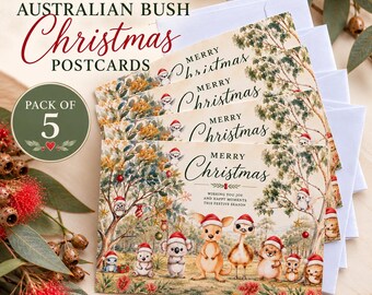 May include: A pack of 5 Australian Bush Christmas postcards measuring 148 mm by 105 mm. The cards feature illustrations of a koala, kangaroo, emu, and other animals wearing Santa hats in a forest setting with the text Merry Christmas.