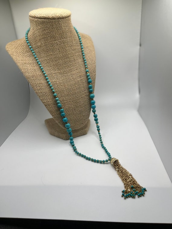 Bohemian style turquoise tassel necklace.