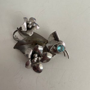 Vintage signed Walter Lampl sterling flower brooch with blue topaz