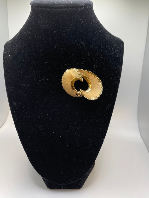 Coro gold tone Brooch.