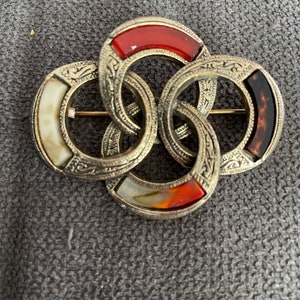 VINTAGE MIRACLE signed brooch with four inset panels of various stones