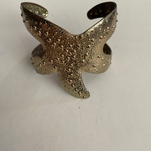 Lily Pulitzer starfish gold tone silhouettecuff bracelet.