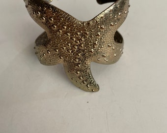 Lily Pulitzer starfish gold tone silhouettecuff bracelet.