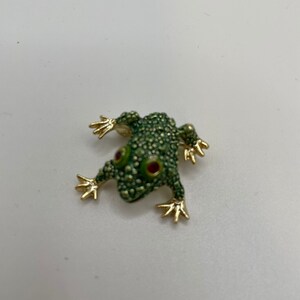 Vintage gold tone hand painted green Frog with ruby red gemstone eyes brooch