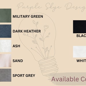May include: A chart showing available colors for a t-shirt. The colors are: Military Green, Dark Heather, Black, Ash, Sand, White, and Sport Grey. The text "Purple Skye Designs" and "Available Colors" is also included.