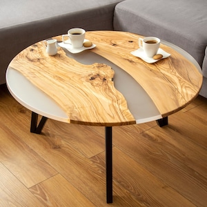 Custom made round coffee table in olive wood and epoxy resin, unusual coffee table