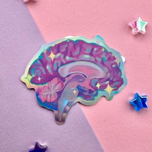 Könnte beinhalten: Ein holografischer Aufkleber eines rosa und violetten Gehirns mit einer Blume und Glitzerakzenten.