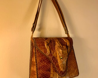 alligator head purse