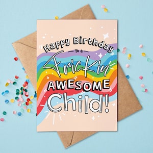May include: A pink birthday card with a rainbow design and the text "Happy Birthday to a Frick'in Awesome Child!"