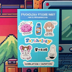 May include: A blue sticker sheet with psychology-themed stickers. The sheet includes stickers with a pink brain, a bottle labeled "Pavlov", a dog, a mouse, and a ghost. Text includes "Psychology" and "Correlation &ne; Causation."