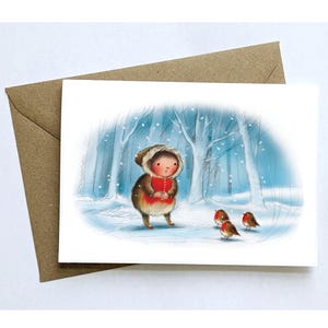 Carte des rouges-gorges de Noël. Carte unique ou lot de 2, 4 ou 8. Carte de Noël A6 illustrée représentant une petite fille et des rouges-gorges dans une scène enneigée