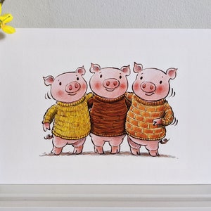 May include: Three pink pigs wearing sweaters, one yellow, one brown, and one orange, are standing side by side and smiling.