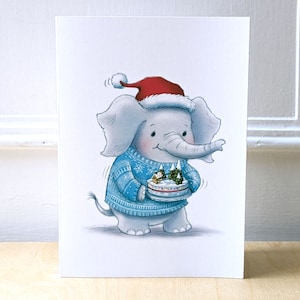 Carte d'éléphant de Noël. Carte individuelle ou lot de 2, 4 ou 8 - Éléphant festif portant un gâteau de Noël ! Carte de Noël A6 illustrée.