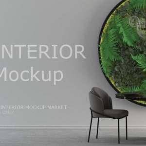 May include: Interior mockup featuring a modern dining area. A round black table is set with plates and glassware, surrounded by gray chairs. A circular wall decor with greenery and a bubble chandelier adds a natural touch. The text "INTERIOR Mockup" is displayed on the wall.